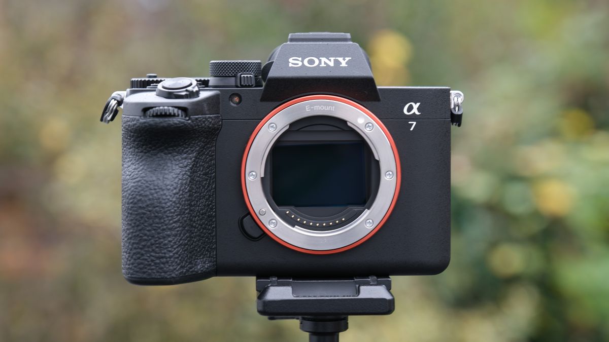 Sony A7V camera from the front, on a tripod outside